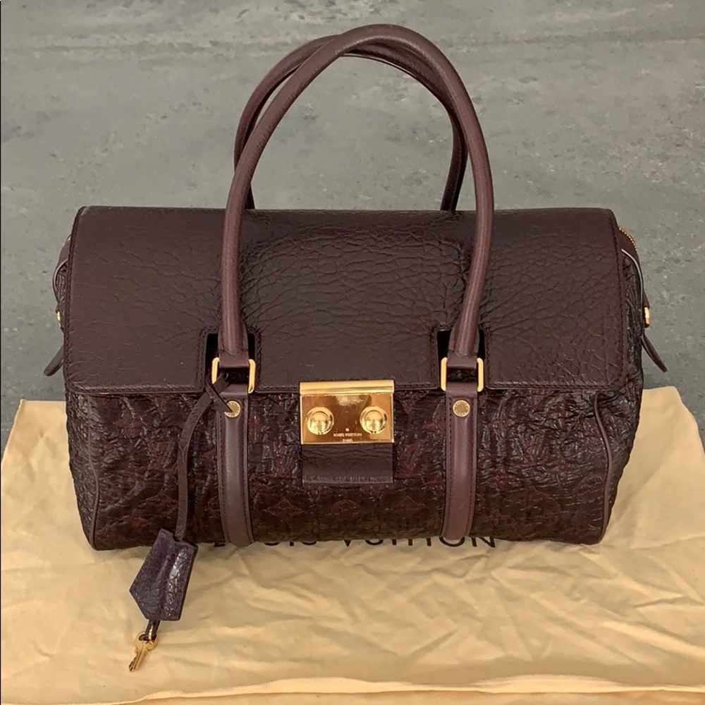 LOUIS VUITTON VOLUPTE PSYCHE HANDBAG
